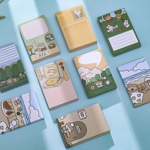 Close-up of cute cartoon sticky notes with beach and room illustration patterns