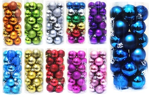 Detail of assorted Christmas baubles set in glossy, matte, and glitter finishes for decor