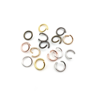 Assorted metallic jump rings in gold, silver, and bronze for DIY jewelry making