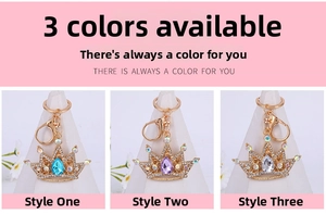 Detail of crown keychains with crystals in blue, purple, and clear on pink background