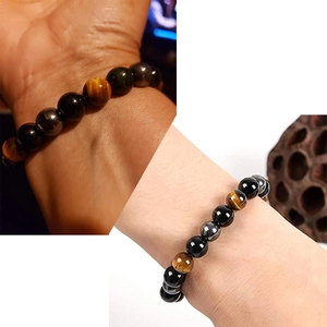 Handmade tiger eye and hematite stone bead bracelet for men and women on wrist