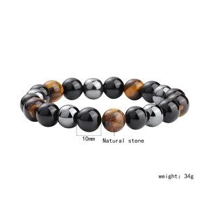 Detail of 10mm tiger eye and hematite natural stone beaded bracelet weighing 34g
