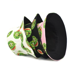 Fashionable reversible bucket hats with cartoon watermelon print in white, black and pink