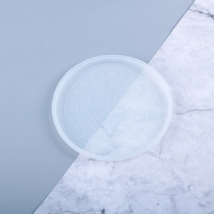 Macro detail of translucent silicone rune mold with intricate engraved mystical patterns