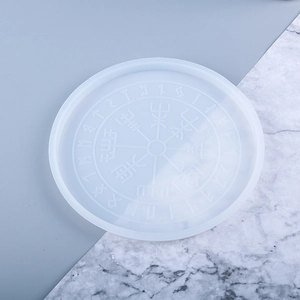 Detail of round silicone resin mold featuring Vegvisir and Nordic Runic symbols