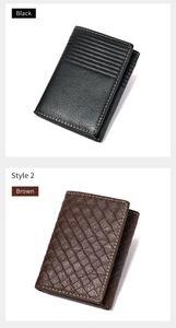 Detail view of black ribbed and brown woven leather RFID wallets with contrast stitching