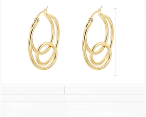 Macro detail of gold-plated stainless steel knot earrings with 35x33mm size dimensions