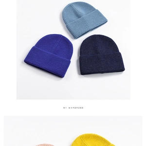 Detailed knit texture and color options of ribbed cuff beanies in various vibrant shades