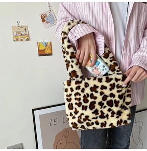 Detailed view of leopard faux fur tote bag showing soft texture and spacious interior