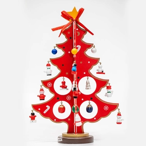 Close-up of wooden red DIY Christmas tree with colorful ornaments and star topper