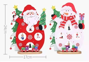 Detailed view of wood Christmas ornaments with Santa and Snowman motifs showing size 24x17cm