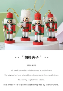 Set of four 10cm wooden nutcracker soldier ornaments with festive glitter and gold strings