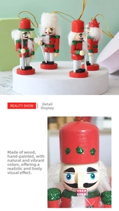 Detail of 10cm hand-painted wooden nutcracker soldiers with gold hanging strings