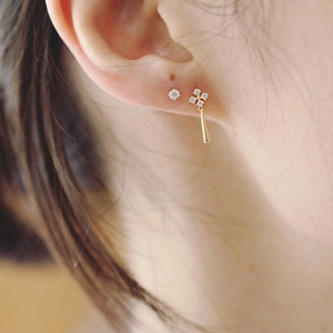 Elegant 14K gold plated S925 silver earrings with sparkling zircons on female model