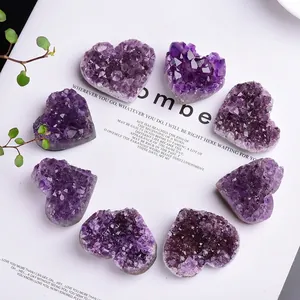 Natural heart-shaped amethyst crystal clusters arranged in a decorative circle