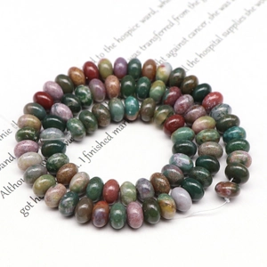 Detailed view of colorful natural stone abacus beads for DIY jewelry making