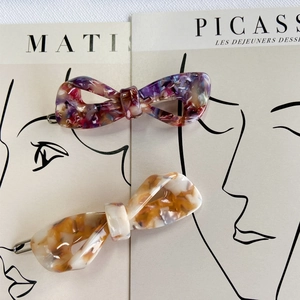 Artistic marble pattern acetate bow hair clips with elegant spring metal fasteners