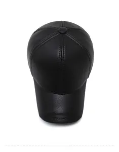 Macro view of black faux leather baseball cap crown with stitch details and Sport logo