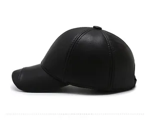 Side view of black leather baseball cap showing fine litchi texture and 6-panel design