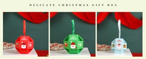 Three-color Christmas candy gift boxes with handles in red, green, and light blue