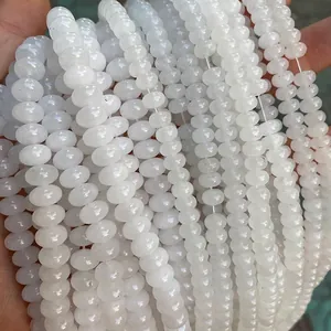 Close-up of white translucent natural stone abacus beads for DIY jewelry making necklaces