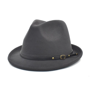 Detailed view of grey wool fedora hat featuring black leather band and gold metal hardware