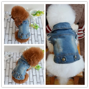 Retro washed denim dog vest for small pets like Poodle and Bichon shown on a brick wall backdrop