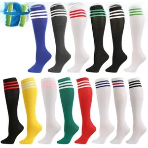 Grid view showing 14 color variants of thick thermal slipper socks with athletic stripes
