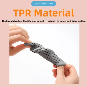 Filtro per lavandino flessibile in silicone TPR grigio ruotato per mostrare elasticità