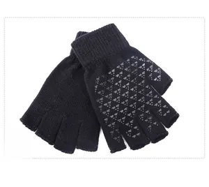 Detail view of black knitted half-finger gloves featuring non-slip triangular palm grip