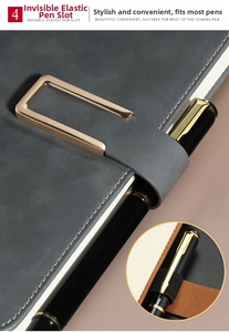 Detail of dark grey business notebook with elastic pen loop and metal buckle closure