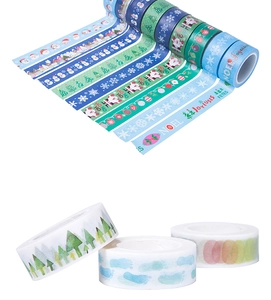 Detailed view of Christmas washi tape set featuring Santa and forest themes