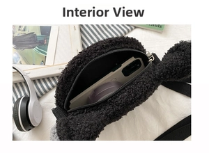 Interior view showing black faux shearling crossbody bag with zipper and soft fleece texture