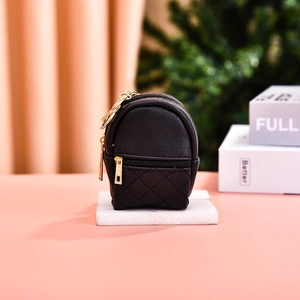 Mini black PU leather coin purse with quilted pattern and gold zipper for keys and lipstick