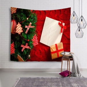 Detail view of Christmas tapestry with festive patterns hanging on a white brick wall decor