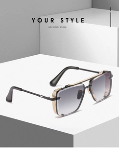 Detail view of steampunk square sunglasses with metal mesh side shields and gold accents