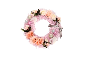 Detail of pink Christmas wreath with roses, feather base, and Happy Everyday ribbon
