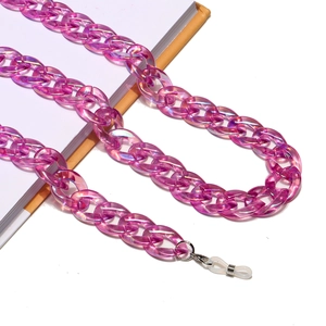 Detail of pink acrylic glasses chain with aurora iridescent coating and silicone loop