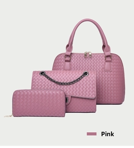 Detailed view of the pink woven texture 3-piece set including tote, chain bag and wallet