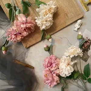 Elegant 3-head silk peony bouquet in pink and cream white with realistic green leaves