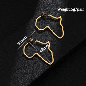 Macro shot of gold Africa map outline earrings with size and weight measurements