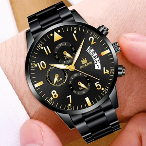 Close-up of SHAARMS business watch with black steel strap and gold markers on the wrist