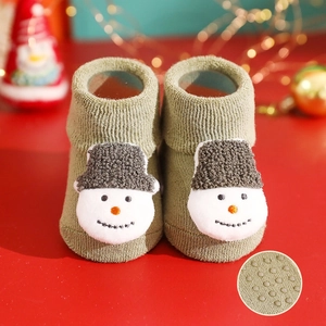 Thickened baby Christmas socks with cute 3D snowman design, anti-slip bottom for safety.