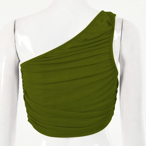 Close-up of the green one-shoulder ruched top back detail on a model with a slim fit