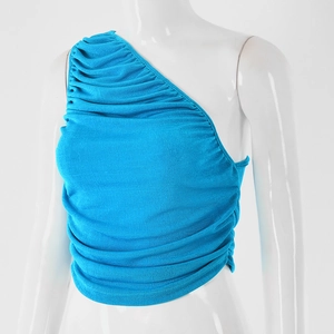 Detail view of the ruched shoulder design on a slim fit blue one-shoulder top