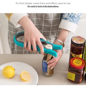 Close-up of person using a 4-in-1 multifunctional non-slip bottle opener for jars