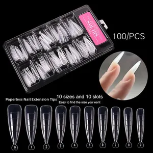 Detailed view of 100pcs clear nail extension forms with scale marks in a storage box