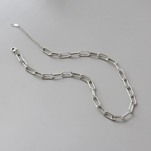 Macro shot of S925 sterling silver hallmark on rectangle link chain lobster clasp