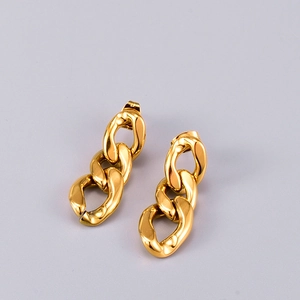 Detailed macro view of 18K gold plated titanium steel chain link hoop earrings