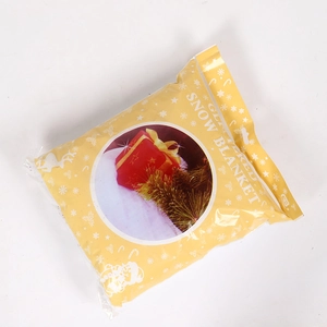 Artificial snow blanket roll in festive packaging for Christmas winter scenery decoration